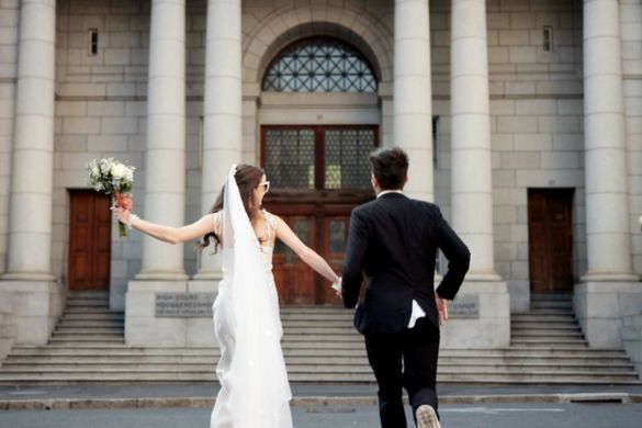 a newlywed couple celebrate being just married
